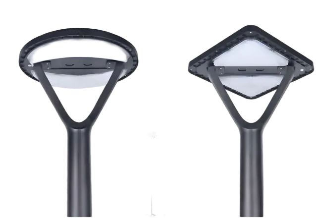 Two modern black outdoor light fixtures on poles, one featuring a round top frame and the other a diamond-shaped top frame.