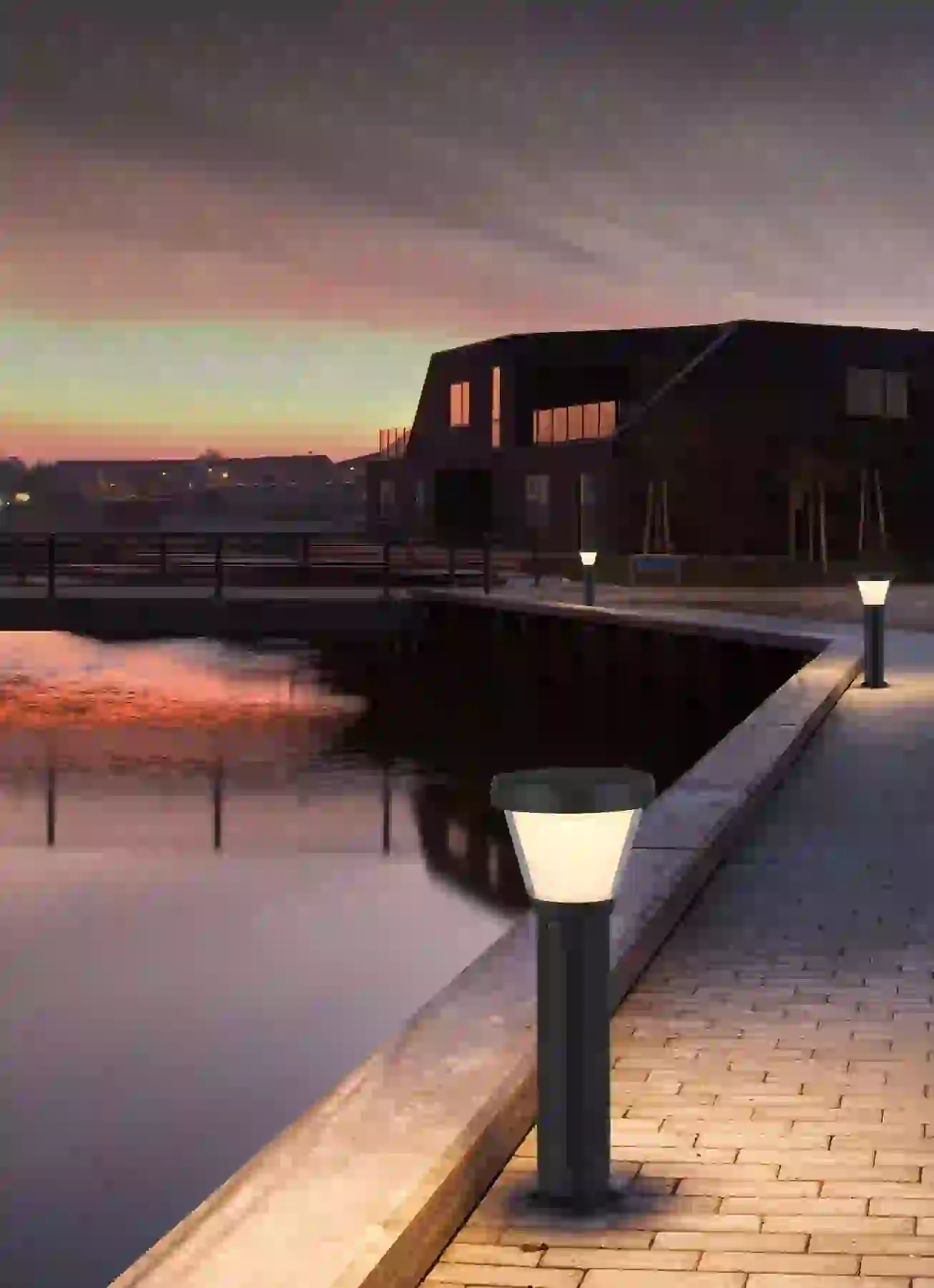 CPD-2106 solar light beside a patio seating area