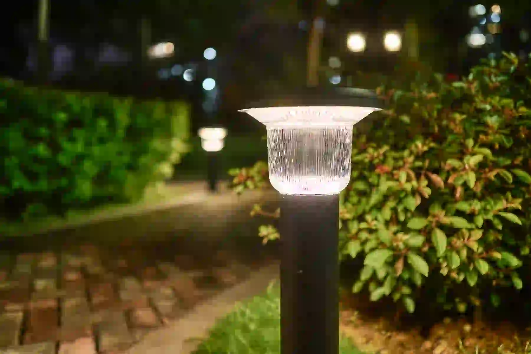 CPD-2204 solar light beside a patio seating area